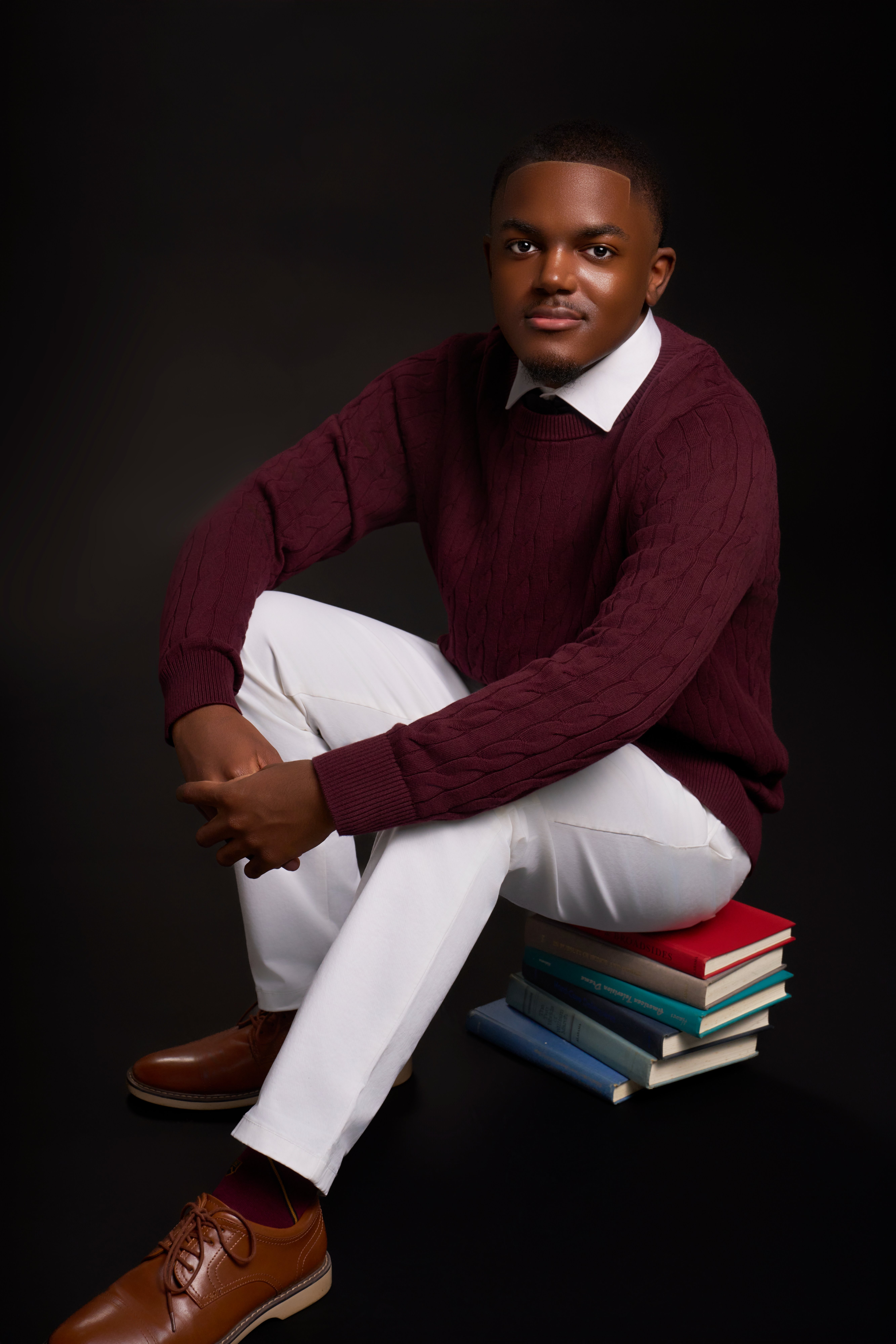 Jahiem Wilcher with books